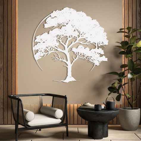 PRICES MAY VARY. Tree of Life Metal Wall Art: The metal tree wall art are crafted with attention to detail and finished in a sleek metallic finish that adds a touch of glamour to any space. The tree of life elements in the design add a touch of nature, creating a tranquil atmosphere in the room Tree of Life Wall Art: The tree of life outdoor wall art are made of high-quality cold-rolled steel, smooth and lightweight, can decorate your room for a long time. Each piece is individually handled and Family Tree Wall Decor, Metal Tree Art, Tree Of Life Wall Art, Wall Art Tree, Elegant Living Room Decor, Metal Tree Wall Art, Family Tree Wall, Art Tree, Tree Wall Decor