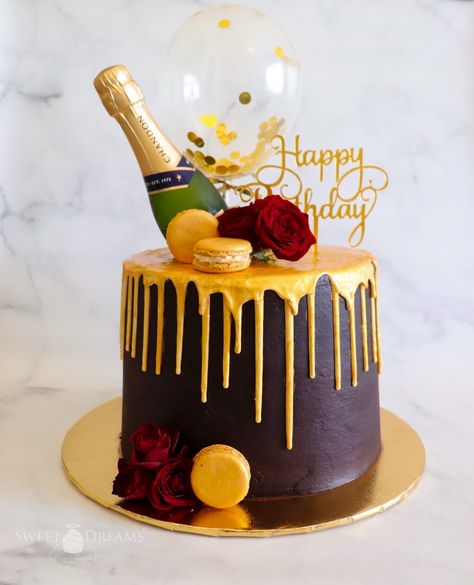 Burgundy Birthday Cake with Gold Drip and Adorned with Macarons, Roses, Mini Champagne Bottle, Glittery Gold Balloon, and Birthday Cake Topper Cake With Beer Bottle, 60 Years Birthday Cake, Burgundy Birthday Cake, Icing Board, Wine Theme Cakes, Champagne Cakes, Cake With Gold Drip, 25th Cake, Champagne Bottle Cake