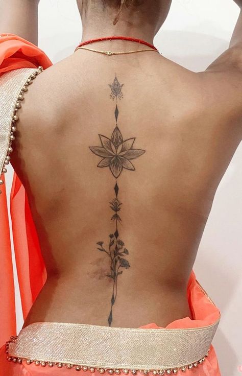 Lotus Flower Spine Tattoos For Women, Lotus Spine Tattoos For Women, Lotus Spine Tattoo, Primitive Tattoo, Tattoo Ideas Inspiration, Flower Spine Tattoos, Spine Tattoo Ideas, Waist Tattoos, Chic Tattoo