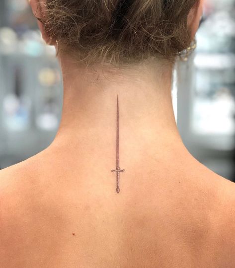 We rounded up pictures of the coolest back-of-neck tattoos that are sure to inspire your next ink. From tiny to more elaborate, you'll love these ideas! Dr Tattoo, Armor Of God Tattoo, K Tattoo, Single Needle Tattoo, Back Of Neck Tattoo, Foot Tattoos For Women, Dagger Tattoo, Back Tattoo Women, Tattoo Designs And Meanings