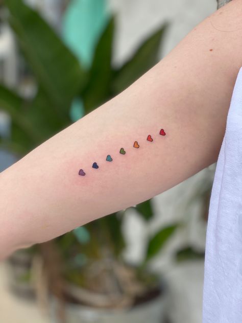 Lesbian Symbol Tattoo Ideas, Lgbtqia Tattoo Ideas, Rainbow Hearts Tattoo, Minimalist Pride Tattoos, Love Is Love Tattoo Pride, Subtle Gay Tattoo, Rainbow Tattoos Pride, Subtle Pride Tattoo, Bisexual Tattoo Ideas