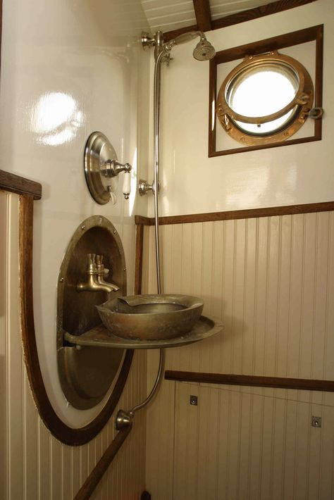 Folding submarine sink from WWII works perfectly in Vagabonds head.  Adjustable nickel shower fixtures and Baby Blake Head (Not visible) Nickel Shower Fixtures, Yacht Ideas, Spartan Trailer, Steampunk Bathroom, Micro Living, Boat Interior Design, Sailboat Interior, Nautical Interior, Rustic Bathroom Shelves