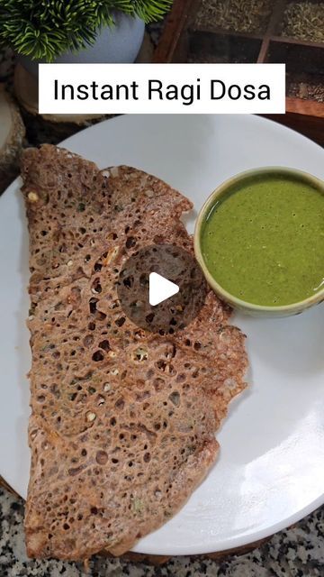 Kanak Gurnani on Instagram: "Instant Ragi Dosa
Healthy Breakfast Recipe 

You just need 15 mins to make this Healthy and Nutritious Breakfast. Do try and let me know if you like it❤️
Ingredients 
Ragi Flour 1/2 Cup
Suji 2tbsp
Rice Flour 2tbsp
Green Chilli 2
Ginger 1tbsp
Carrot 1/4 Cup
Onion 1/4 Cup
Jeera 1tbsp
Salt to taste 
Black Pepper 1.5 tsp
Fresh Coriander Leaves 2tbsp
Water 1.5 Cups
Paneer
Chilli Flakes 
Ghee/Oil as required 
Steps
➡️ Take a mixing bowl and add Ragi Flour , Rice Flour & Suji along with vegetables , spices. Add water and make a thin runny batter as shown in the video. 
➡️ Spread on hot tawa and cook until crisp. Add some grated paneer and Chilli flakes if you like.
➡️Enjoy with homemade Chutney of your choice.

Love #kanak_gurnani 

#ragidosa #ragi #fingermillet #mill Instant Ragi Dosa Recipe, Ragi Flour Recipes, Homemade Chutney, Ragi Recipes, Ragi Dosa, Ragi Flour, Healthy Breakfast Recipe, Nutritious Breakfast, Coriander Leaves