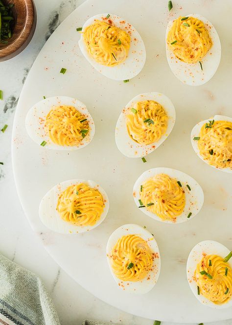 These classic deviled eggs with dill pickle are so nostalgic! With a creamy, tangy filling studded with diced dill pickle and and enhanced with dill pickle juice, these deviled eggs are just like mom used to make (for me, literally!) We love this classic deviled eggs recipe, they're a must for just about any occasion. Deviled Eggs Pickle, Deviled Eggs With Dill, Dill Deviled Eggs, Recipes With Meat, Classic Deviled Eggs Recipe, Dill Pickle Juice, Jalapeno Deviled Eggs, Classic Deviled Eggs, Deviled Eggs Recipe Classic