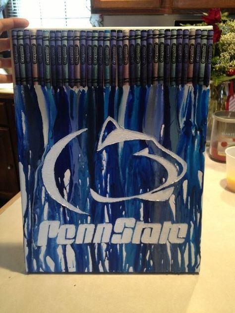 PSU Melted Crayon Canvas | 8 Penn State-Themed Ways To Upcycle This Spring Organizing A Craft Room, Penn State Crafts, Melted Crayon Canvas, Crayon Canvas, State Crafts, Penn State Football, Pennsylvania State University, Penn State University, Crayon Art Melted