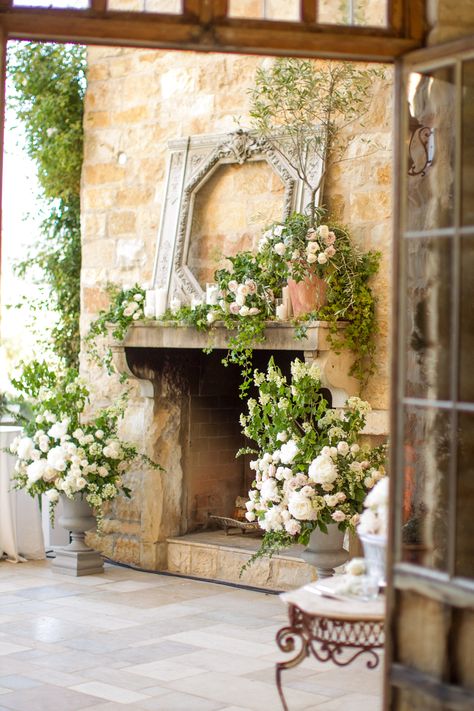 Fireplace Mantle flower, vines and candles.  English ivy and olive branches.  Wedding at Sunstone Villa, California ~ www.adornmentsflowers.com / Photo:  Mike Larson Photography Olive Branches Wedding, Fireplace Flowers, Wedding Mantle, French Weddings, Tree Branch Wedding, Sunstone Villa, Kim Wedding, Branches Wedding, Mantle Fireplace