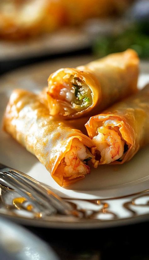 These crispy shrimp and cabbage egg rolls are the perfect appetizer or snack! Filled with succulent shrimp, crunchy cabbage, and savory seasonings, each bite is bursting with flavor. Serve with a tangy dipping sauce for an irresistible treat that’s sure to impress! Pescatarian Snacks, Cabbage Egg Rolls, Cabbage Egg, Shrimp Egg Rolls, Spiced Eggs, Shrimp Spring Rolls, Crispy Shrimp, Egg Roll Wrappers, Shrimp Seasoning