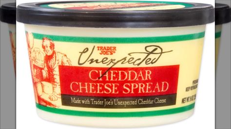 The 12 Most Underrated Cheeses At Trader Joe's - Mashed Pretzel Thins, Cheddar Recipes, Seasoned Crackers, Cheddar Dip, Cheese Spread Recipes, Creamy Scrambled Eggs, Spreadable Cheese, Cheddar Cheese Sauce, Cheddar Chicken