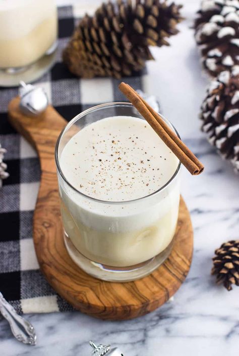 Enjoy homemade eggnog without worrying about raw eggs in this easy, completely cooked eggnog recipe. It stays for days and makes enough for a small crowd, but can be scaled up or down as needed. Delicious with alcohol or without! Cooked Eggnog Recipe, Coconut Rum Cocktails, Cooked Egg Nog, Eggnog Recipe Homemade, Coquito Recipe, Homemade Eggnog, Holiday Drink, Eggnog Recipe, Egg Nog