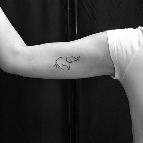 Top 61 Best Small Elephant Tattoo Ideas - [2021 Inspiration Guide] Elephant Tattoos Men Small, Elephant Collar Bone Tattoo, Minimalist Elephant Tattoo Simple, Minimalist Tattoo Elephant, Elephant Tattoo Design For Women Small, Elephant Arm Tattoos For Women, Small Elephant Tattoo Outline, Single Line Elephant, Africa Tattoos Small