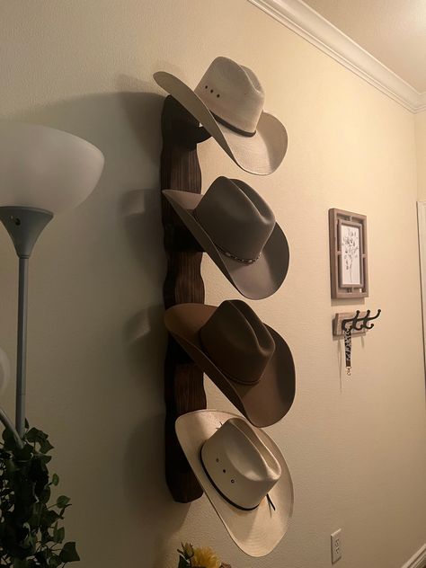 Howdy! Now that this years rodeo season is in full swing and summer is here, I am making a few of these cowboy hat display racks. I am a junior at Sam Houston State University and these will help offset my tuition cost. They are made with pine and have durable plastic hooks that hold each hat at an angle for display. These are meant for indoor use only, and the hooks will warp if left out in the heat. Each hat rack is unique and is one of a kind! There are three available sizes: Small (2 hats): Home Decor Ideas Country Rustic, Decorating With Cowboy Hats, Cowboy Hat Hanging On Wall, Hat Wall Aesthetic, Cowboy Hat Room Decor, Simple Country Room Ideas, Cowboy Hat Storage Ideas Diy, Cute Western Decor, Cowboy Boot Display Bedroom