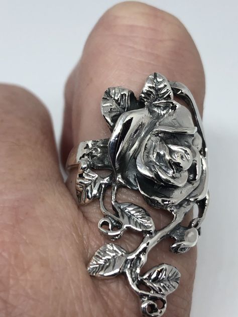 Lovely and delicate Rose flower ring 925 Sterling silver with black rhodium Size 6 or 9 or 10 can be re sized for you on request. My jeweler charges $10 All rings are shipped in a nice gift box. Check out our over a THOUSAND great reviews Engraving is $4 per letter and is not always perfect depending on the piece. It can take a few days if the jeweler is busy. This is payable to Paypal Judithsltd@gmail.com Cool Silver Rings, Vintage Sterling Silver Jewelry With Rose Design, Vintage Silver Jewelry With Roses, Gothic Sterling Silver Rings In Antique Silver, Goth Rings, Luxury Vintage Sterling Silver Flower Ring, Black Rose Ring, Rose Flower Ring, Rose Jewellery