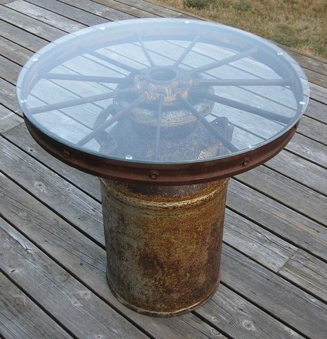 Wagon Wheel Table | I made this table from an old milk can &… | Flickr Roda Gerobak, Wagon Wheel Table, Milk Can Table, Milk Can Decor, Wagon Wheel Decor, Old Milk Cans, Small Dining Room Table, Wheel Decor, Mesa Exterior