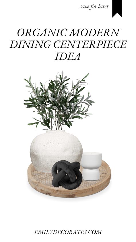 dining table centerpiece with olive branches in a white textured vase, a black wooden knot, a white ceramic candle, all centred in a rattan tray. Dining Centerpiece Ideas, Organic Modern Dining, Dining Table Decor Modern, Modern Table Centerpieces, Everyday Centerpiece, Black Centerpieces, Dining Centerpiece, Modern Centerpieces, Shabby Chic Dining