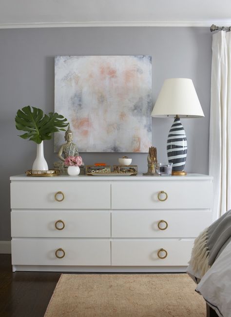 What you didn't spend on your dresser, you should put towards some heavy brass pull rings like this blogger did — the luxurious weight of the knobs makes the dresser feel way fancy. Get the tutorial at Elements of Style »   - HouseBeautiful.com Ikea Malm Dresser, Malm Dresser, Ikea Dresser, Diy Hanging Shelves, Dressers Makeover, Dresser Top, Ikea Malm, White Dresser, Floating Shelves Diy