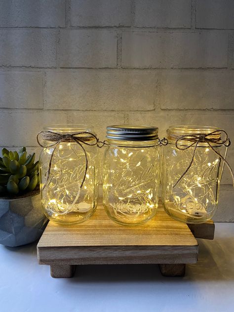 Mason Jar With Jute Twine, Mason Jars Centerpieces, Lighted Mason Jars, Fairy Lights In A Jar, Gold Mason Jars, Deck Table, Lighted Centerpieces, Mini String Lights, Copper Wire Lights