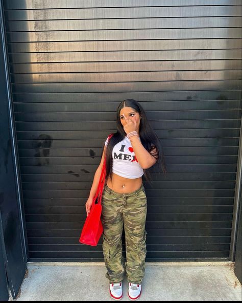 Camp Cargo Pants Outfit, Camouflage Outfits For Women, Camo Cargo Pants Outfit Street Style, Camo Pants Outfit Baddie, Red Telfar Bag, Red Cargo Pants Outfit, Army Cargo Pants Outfit, Cargo Army Pants, Camp Pants Outfit