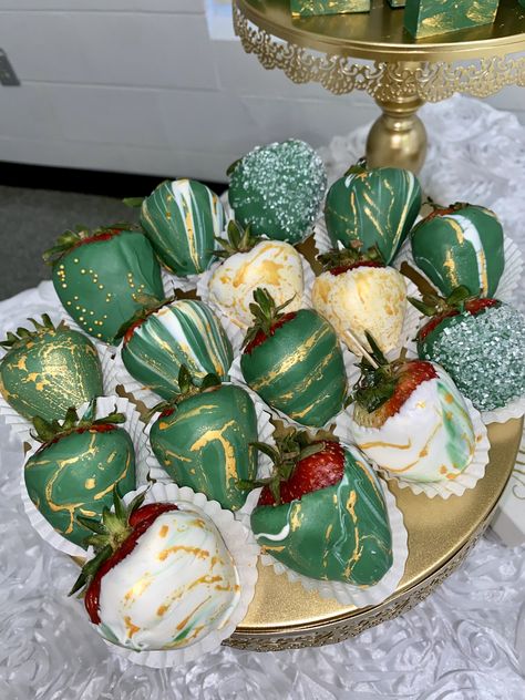 Emerald Green And Gold Treats Table, Sweet 16 Party Emerald Green, Dessert Table Ideas Emerald Green, Emerald And Gold Treats, Green And Gold Strawberries Chocolate, Dessert Table Enchanted Forest, Green And Gold Treat Table, Emerald Green Snack Table, Emerald Green Quinceanera Dessert Table