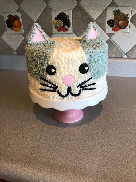 Cat Face Birthday Cake, Kitty Smash Cake, Kitty Cat Birthday Cake Ideas, Kitten Birthday Party Cake, How To Make A Kitty Cat Cake, Kitty Cat Birthday Party Cake, Cat Cake Buttercream, Super Kitty Cake, Grey Cat Cake