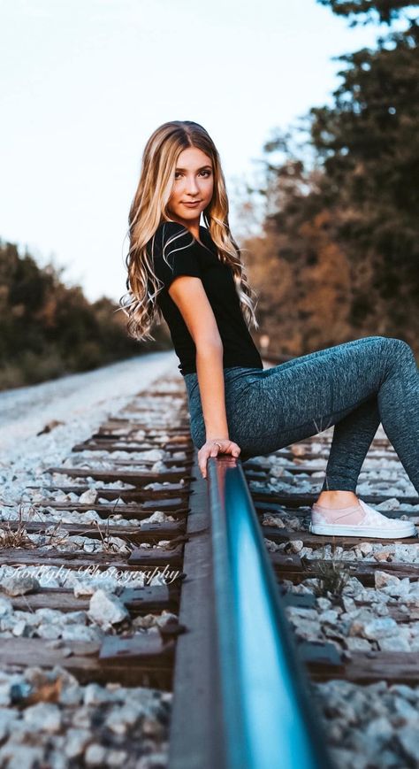 Railway Photoshoot Ideas, Photoshoot Railroad Tracks, Poses On Railroad Tracks, Photos On Railroad Tracks, Photoshoot On Railway Track, Railway Track Photoshoot, Senior Picture Ideas Cloudy Day, Travel Senior Pictures, Railroad Graduation Pictures