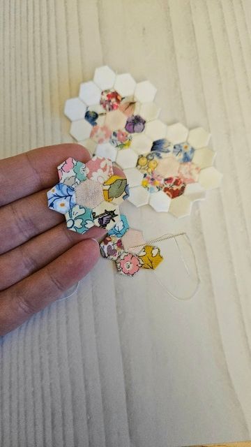 🌺ℝ𝕒𝕔𝕙𝕖𝕝 🌺 on Instagram: "Come and micro patchwork with me! These tiny quarter inch hexies are being made into a tiny grandmothers garden panel. I'm not sure how big it will be yet. it's been sitting in my fabric drawer for 2 years+ so I decided to pull it out today! I started it as a way to use up tiny @libertyquilting scraps. #epp #eppinspiration #micromini #scrappyquilt #scraphexies #scrappypatchwork #englishpaperpiecing #libertyscraps #libertyquilt" Tiny Sewing Projects, Tiny Quilts, Liberty Quilt, Mini Patchwork, Scrap Fabric Projects, Miniature Quilts, Scrap Material, Fabric Drawers, Scrappy Quilt