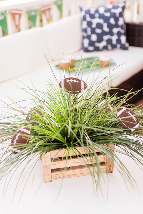 Love this DIY faux grass football centerpiece for game day-- seriously, how cute are the little footballs?! Would make an sports banquet centerpiece, too! Also, if you're looking for game day appetizers for a crowd, click through for popular Missouri blogger Stephanie Ziajka's favorite game day meatball recipe, along with more tailgate party and game day decor ideas (like this DIY faux grass centerpiece!) and snack recipes! #gameday #centerpiece #fauxgrass #football #tailgating #sponsored Simple Football Centerpieces, Turf Centerpieces, Tailgate Party Centerpieces, Sports Banquet Decor, Football Graduation Centerpiece Ideas, Tailgate Centerpieces, Football Centerpiece Ideas, Football Banquet Ideas, Game Day Meatballs