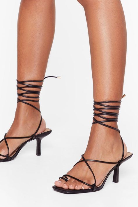 Step up, the dancefloor's calling. These heels come in faux leather and feature a strappy design, toe loop, wrap design, tie closure, square toe, and kitten heel. Lace Up Heels, Valentino Studs, Suede Heels, Online Accessories, Black Heels, Shoes Online, Eye Candy, Fashion Clothes Women, Kitten Heels