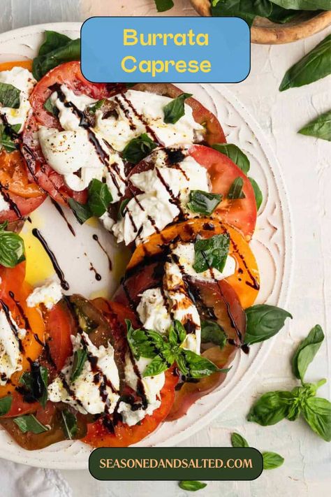 Celebrate summer with this mouthwatering Burrata Caprese Salad. Juicy tomatoes, creamy burrata, and a slight twist make it the perfect dish for any gathering. Burrata Caprese Salad, Burrata Caprese, Recipe With Tomatoes, Caprese Recipes, Caprese Salad Recipe, Walnut Pesto, Buffalo Mozzarella, Italian Salad, Homemade Pesto