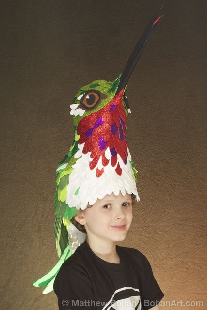 Matthew Bohan's Hummingbird Hat made of craft foam Hummingbird Halloween Costume, Hummingbird Costume Diy, Halloween Hat Ideas, Humming Bird Costume, Diy Bird Costume, Hummingbird Mask, Hummingbird Costume, Halloween Hats Diy, Bird Halloween Costume