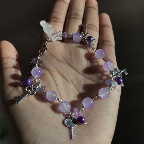 (sold) adjustable key charm bracelet 🗝️💜made with purple pearl , lustrous purple gradient, amethyst crystal chip & white quartz♾️ all chains made by hand 🌱 $8 , dm to purchase this 1of1 piece🫶🏾 more charm bracelets will come soon on my website 🤭 charm bracelet | amethyst | silver jewelry | handmade jewelry #explore #jewelryinspiration #bracelets #smallbusiness #charmbracelets #crystal Purple Charm Bracelet, Bracelet Inspo, Purple Gradient, Come Soon, Purple Pearl, Silver Jewelry Handmade, White Quartz, Amethyst Crystal, Jewelry Handmade