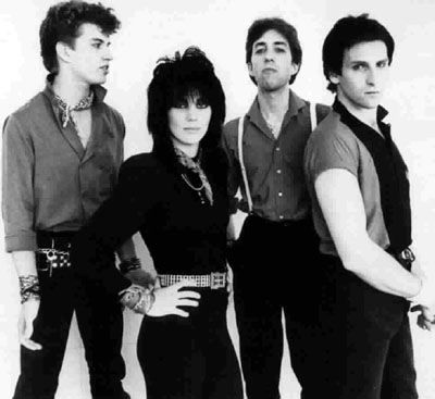 Joan Jett And The Blackhearts- This group was formed by former "Runaways" guitarist Joan Jett. This "Kick your 'nads" group was a hard hitting chart topper in the early 1980s. Joan Jett And The Blackhearts, Suzi Quatro, Cherie Currie, Singing Groups, Rock Musicians, The Runaways, Lita Ford, Woman Singing, Women Of Rock