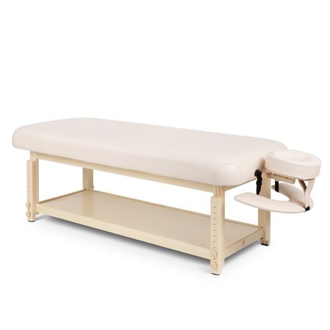 The Woodloch Stationary Massage Table's classic design stands the test of time in every spa environment when it comes to durability, comfort, and functionality. Constructed with solid European beech wood in a natural finish, the Woodloch features height adjustment, 3.5" thick multi-layered cushion for maximum client comfort, rounded corners, durable vinyl upholstery, and a face cradle with armrest. This comfortable stationary massage bed further impresses with headrest outlets on both ends, doub Skincare Table, Esthetician Bed, Stationary Table, Spa Room Ideas Estheticians, Spa Table, Spa Room Ideas, Spa Suite, Massage Room Design, Minerva Beauty