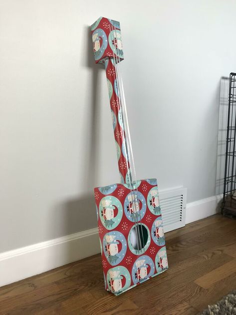 Concert Tickets, Wrapped! How To Wrap A Guitar As A Gift, How To Wrap Concert Tickets As A Gift, How To Gift Concert Tickets Christmas, Ways To Wrap Christmas Gifts, Christmas Wrapping Ideas Creative, Wrap Christmas Gifts, Grandchildren Gift Ideas, Fake Gifts, Pony Gift