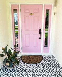 Wall Decor Foyer, Foyer Wall Decor, Pink Front Door, Foyer Wall, Matte Porcelain Tile, Foyer Rug, Foyer Lighting, Pink House, Winter Home