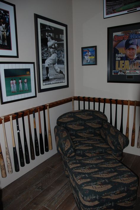 Sports Memorabilia Room, Baseball Bat Display, Bat Display, Museum Curator, American Football League, Trophy Rooms, Baseball Memorabilia, Sports Room, San Diego Chargers