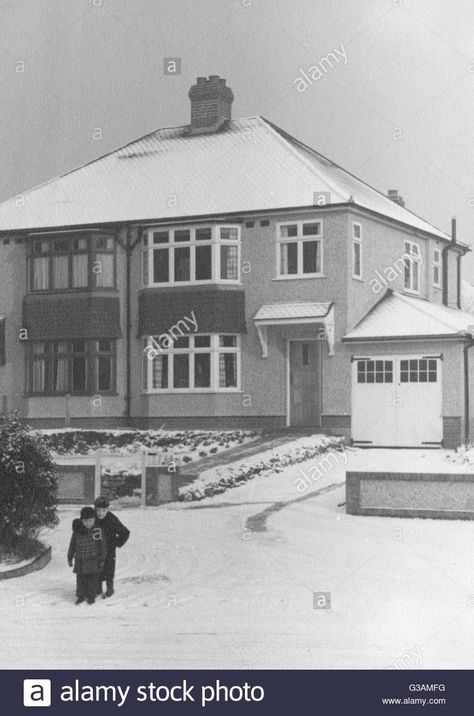 1930s Semi-detached House in winter. The two youngest occupants of the house are pictured in the foreground. Picture taken in the early 1950s. Date: early 1950s Stock Photo 1950s Bungalow Exterior, 1930s Semi Detached House, 1930s Semi, British Houses, 1950s Decor, 1930s House, Edwardian House, Bay Windows, Red Square