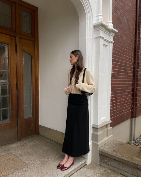 Maroon ballet flats, black maxi skirt, pale yellow knit cardigan, ootd Midi Skirt With Ballet Flats, Ballet Flats With Dress Outfit, Long Skirt With Flats, Flats With Skirt, Skirt Flats Outfit, Long Skirt Ballet Flats, Ballet Pumps Outfit 2023, Classy Flats Outfit, Black Cardigan Skirt Outfit