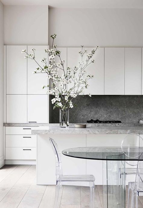 A joint effort between the stylist owner and architect of this Melbourne home has produced a spectacular meeting of styles 120 years apart. French Oak Flooring, Acrylic Chair, Gray And White Kitchen, Mcm House, Road House, Stone Backsplash, Melbourne House, White Kitchen Design, Grey Kitchen