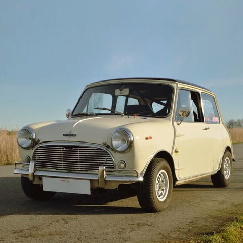 At the launch of the Mini in 1959, John Cooper was regarded as one of the best constructors of formula and rally cars, and he immediately recognized the potential of the small well-handling Mini. The Mini Cooper “S” soon became the preferred weapon of choice for some of the best rally drivers of that area. Austin Mini Cooper, Mini Cooper One, Rally Drivers, Monte Carlo Rally, Sun Roof, Austin Mini, John Cooper, Rally Cars, Mini Classic