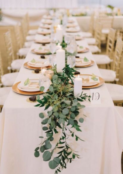 Runners of silver dollar eucalyptus, green nagi, and leather leaf with scattered LED votives in gold mercury glass holders going down the length of the table Rose Gold Centerpiece, Long Table Centerpieces, Gold Wedding Centerpieces, Gold Centerpiece, Greenery Wedding Centerpieces, Gold Centerpieces, Centerpiece Wedding, Table Runners Wedding, Party Table Decorations