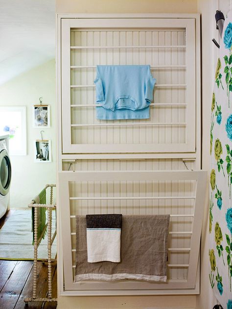 Add fold-out drying racks to a wall to save space while still getting all the function required of a laundry center. Diy Lavanderia, Laundry Room Drying Rack, Small Space Storage Solutions, Homestead Decor, Laundy Room, Laundry Room/mud Room, Laundry Center, Drying Rack Laundry, Laundry Room Inspiration