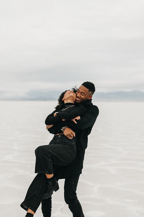 Bonneville Salt Flats Sunrise Couples Session — Annie Zav | Portland Wedding Photographer All Black Couples Photoshoot Outfits, Salt Flats Photoshoot Couple, Salt Flats Utah Photoshoot Winter, Salt Flat Photoshoot, Bonneville Salt Flats Photoshoot, All Black Outfit Couple Photoshoot, Salt Flats Utah Photoshoot Couple, Salt Flats Engagement Photos, Black Outfit Couple Photoshoot