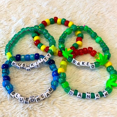 Handmade Word Kandi -This Listing Is For The 5 Bracelets Pictured Above. Cute Rasta Colors With Handmade Leaf Charms One Size Fits Most Stretchy Cord Unique And Fun For Your Next Rave Or Festival! Bundling Is Going To Get You The Best Deal So Check Out My Closet For More Kandi Goodies! Edm Edc Raver Pot Stoner Weed 420 Party Kandi Bracelets Jewelry Beads Plur Glitter Outfit Accessories Rainbow Y2k 90s Neon Trippy Dinosaur Kandi Bracelet, Rave Bracelets Kandi Sayings, Pot Leaf Bracelet, Rave Beads Bracelets, Sullivan King Kandi, Candy Bracelet Ideas Rave, Candy Bracelets Rave, Festival Kandi Ideas, Edc Kandi Bracelets