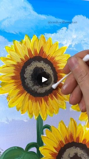 How to paint a Field of Sunflowers 🌻 | Here is a beginner field of sunflowers painting!🎨🌻 In this tutorial I will show you a few new tips and tricks for painting different types of sunflowers.... | By Emily Seilhamer Art | Let me show you how to paint a field of sunflowers today. I'm excited to show you a couple different beginner techniques. But first you need to design your sky. I'm using my mop brush and 11 by 14 canvas board. And I started with a light purple just doing back and forth strokes because purple and yellow complement each other. Then using a sky blue and white. I'm blending that into the light purple. And at the very top I'm going to take a darker bright blue and blend that down into the sky blue because I want it to be slightly darker at the top to frame our eye downwar Sunflower Field Painting, Sunflower Drawings, Types Of Sunflowers, A Field Of Sunflowers, Sunflowers Painting, Field Of Sunflowers, Sunflower Crafts, Sunflower Drawing, Van Gogh Sunflowers