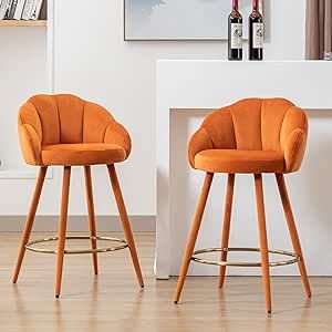 These luxious barstools features unique curved back & tufted decor plus vivid color & modern metal legs which are upholstered in velvet giving these bar chairs a contemporary appearance Orange Counter Stools, Modern Barstools, Chairs For Kitchen Island, Yellow Bar Stools, High Tables, Colorful Bar Stools, Airbnb Decor, Velvet Stool, College House