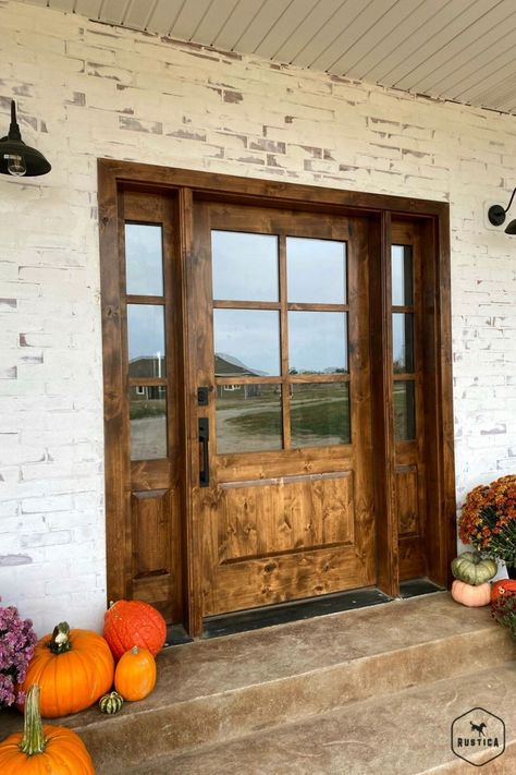 Capture the contemporary feel you’ve been searching for with the Boat House Front Door. This 6-lite front door offers amazing versatility in any style of home while ensuring ample amounts of natural light and warmth – ideal for beautiful sunny days. Whether you’re in the city, country, mountains or beach, our solid knotty alder lumber craftsmanship can be seen from every angle of this 6-lite door. Plus, we offer customizable options so you can pick your finish and texture. Modern Farmhouse Fiberglass Front Door, Country Doors Farmhouse, Rustic Front Door With Sidelights, Stunning Front Doors, Extra Wide Front Door Entrance, Oversized Front Door Farmhouse, Coastal Farmhouse Front Door, Barndominium Front Doors, Barndo Front Door