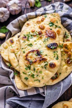 Homemade Garlic Naan. Even if you've never made bread at home before, this soft, chewy, garlicky flatbread is easy to make and well worth the effort. You're going to love serving it with your favorite Indian dishes. | hostthetoast.com Homemade Garlic Naan, Garlic Naan Recipe, Rogan Josh, Flat Breads, Garlic Naan, Naan Recipe, Vindaloo, God Mat, Easy Bread Recipes