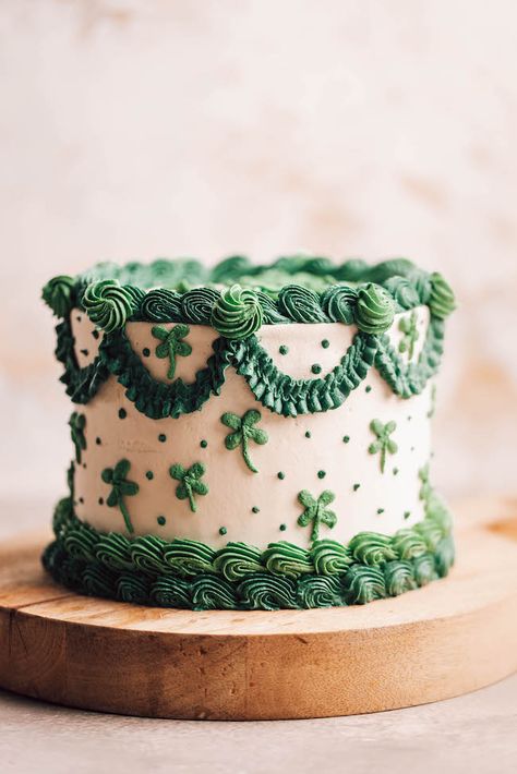 Moist and tender green vanilla cake layers frosted with classic vanilla American buttercream and decorated with vintage piping and shamrocks. Shamrock Cake, Mint Green Cakes, American Buttercream, Irish Theme, Green Cake, Funny Birthday Cakes, Cake Layers, St Patrick's Day Decorations, New Cake