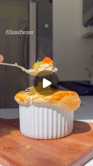 Rachaell Rampini on Instagram: "I can’t help but think anything served in a ramekin is automatically so cute and therefore I need to have it. These single serving pot pies take 5 minutes to prepare making it such a convenient dinner. #HeinzPartner #HeinzGravy 
Chicken Pot Pie for 2
1-1 ½ cup (depending on size of ramekins) cubed or shredded chicken, I used rotisserie
1/2 cup @Heinz Herbes de Provence Gravy, or more if you prefer a saucier filling
1/2 cup frozen peas and carrots
Pie dough or puff pastry, about 4-6 inches in diameter each, depending on ramekins
1 egg, beaten
Preheat oven to 400°F. In a bowl, mix shredded rotisserie chicken, frozen corn and peas. Stir in @Heinz Herbes de Provence Gravy until everything is well coated. Divide the filling evenly between the two ramekins. Cover Chicken Pot Pie Ramekin, Heinz Gravy, Frozen Peas And Carrots, Convenient Dinner, Shredded Rotisserie Chicken, Peas And Carrots, Pot Pies, Herbs De Provence, Single Serving