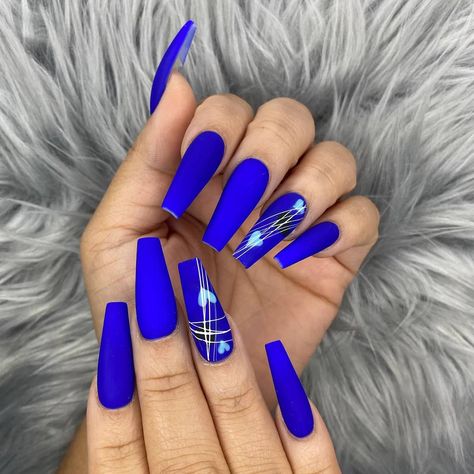 Posted by Zoe Scott: Today, we're zooming in on the chic and stunning Matte Blue Nails. In this quick read, you'll learn everything from picking the perfect blue shade tha... Matt Blue Nails Design, Blue Matte Nails Design, Blue Coffin Nail Ideas, Vibrant Blue Nails, Acrylic Nail Designs Blue, Electric Blue Nails Design, Blue Baddie Nails, Nail Art Designs Matte, Nails With Stripes